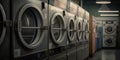 Ow of industrial laundry machines in laundromat in a public laundromat with laundry