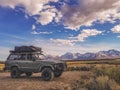 Classic Toyota Landcruiser with Rooftop tent against Sierra Nevada's Royalty Free Stock Photo