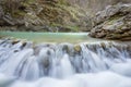 owerful spring mountain creek cascade in a rocky and misty canyon, Pirot, Serbia