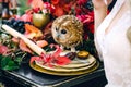 Owl on the festive wedding table with red autumn leaves. Wedding decoration. Artwork Royalty Free Stock Photo