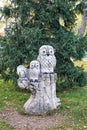 owl figures on a stylized stump made of concrete with imitation wood. Royalty Free Stock Photo