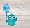 Owl keep Easter decorated egg on a stick. Vector on wooden back