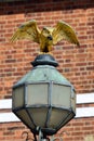 Owl street lght with brick background