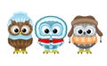 Three owls in winter clothes. Royalty Free Stock Photo