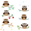 Owls on branches Royalty Free Stock Photo