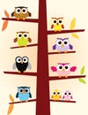 Owls in a tree Royalty Free Stock Photo