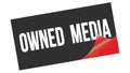 OWNED MEDIA text on black red sticker stamp