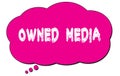 OWNED MEDIA text written on a pink thought bubble