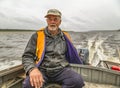 The owner of the boat on the Northern Dvina River.