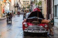 Local man working under the bonnet Royalty Free Stock Photo