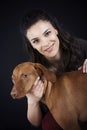 Owner petting a young hungarian vizsla Royalty Free Stock Photo