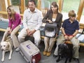 Owners Sitting In Vets Reception Area Royalty Free Stock Photo