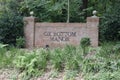 Ox Bottom Manor Neighborhood Sign on a Brick Wall in the Day