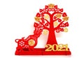 An ox mascot and money tree as symbol of Chinese New Year of the Ox on white the Chinese means good luck