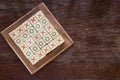 OX tic tac toe wood board game using as background business di Royalty Free Stock Photo