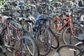 OXFORD, ENGLAND - FEBRUARY 18 2023: Bicycles in racks, eco friendly local transportation.