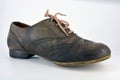 Oxford shoes with gray shoelaces on a flat heel. Gray women`s shoes in a fastening, unwitting.