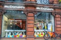 OXFORD STREET, LONDON, ENGLAND- 17th February 2021: McDonald`s with a Just Eat bicycle parked outside