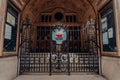 Coat of arms at the gates of a closed City Hall in Oxford, UK