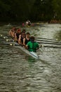 Rowing teams in the river Royalty Free Stock Photo