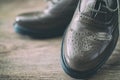 Oxfords shoes retro style stand on the wooden floor.