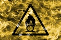 Oxidising materials hazard warning smoke sign. Triangular warning hazard sign, smoke background. Royalty Free Stock Photo