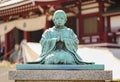 Oxidized bronze statue of sect founder Jodoshu Honen praying when it was a child.