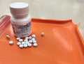 Oxycodone bottle on pharmacy tray with tablets poured out Royalty Free Stock Photo