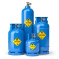 Oxygen gas tanks containers and cilinders of different size isolated on white Royalty Free Stock Photo