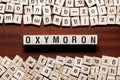 Oxymoron word concept on cubes Royalty Free Stock Photo