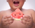 Ã Â¸Âºoy holding out a sliced water melon Royalty Free Stock Photo
