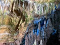 Oylat Cave, mobile photography of a beautiful long cave in the darkness, stalactites and stalagmites