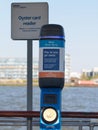 Oyster card and contactless card reader for Thames Clippers at Greenland Surrey Quays Pier.