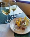 Oyster shooters and two glasses of wine