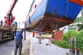 Oyster under a Vietnamese fishing boat