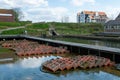 Oysters growing systems, keeping oysters in concrete oyster pits, where they are stored in crates in continuously refreshed water