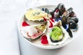 Oysters poached and served with lemon foam and caviar. The other smoked and served with ponzu granite. Royalty Free Stock Photo