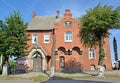 OZERSK, RUSSIA. Facade of the building of the former Catholic chapel early XX century. Kaliningrad region. Russian text - Victor