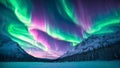 Majestic Aurora Borealis, northern light vibrant colors dances in the night sky over the snowy mountains