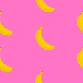 Yellow bananas seamless pattern. Funky background for wrapping paper and fabric. Seamless fruit pattern in pink background. Royalty Free Stock Photo