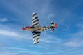 P-51 Mustang in clear blue sky.