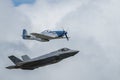 P-51 Mustang and F-35 Lightning II flypast Royalty Free Stock Photo