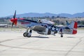 P-51 Man O War Mustang on runway waiting for takeoff.