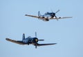 P-51 Mustang and Vought F4U Corsair Fighter Airplanes in Flight