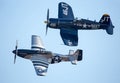 P-51 Mustang and Vought F4U Corsair Fighter Airplanes in Flight