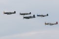 P-51 Mustangs, Supermarine Spitfire, and F4U Corsair in Formation