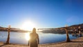 PÃÂ¶rtschach - A girl walking on the lake side, next to a scarecrow