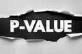 P-VALUE text on torn paper design. Statistical term image representing hypothesis testing, significance, and probability in Royalty Free Stock Photo