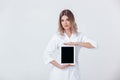 P young doctor showing the screen of digital tablet Royalty Free Stock Photo