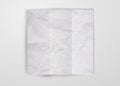 Three times folded white crumpled paper sheet placed on white background. Texture of crumpled paper square card template design